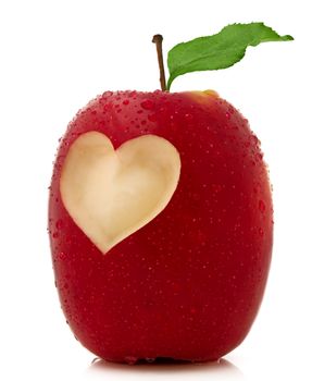 Red apple with a heart symbol isolated on white background