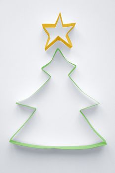 Christmas tree made of paper on white background