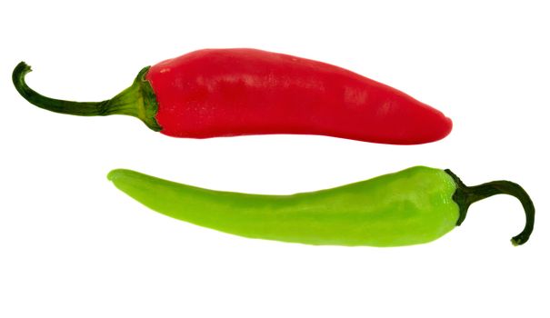 Red and green chili peppers isolated on white. Clipping path included.