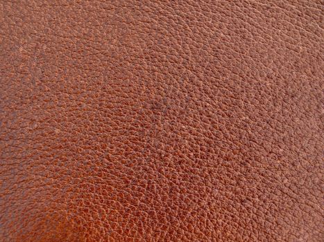 Close up of brown leather background.