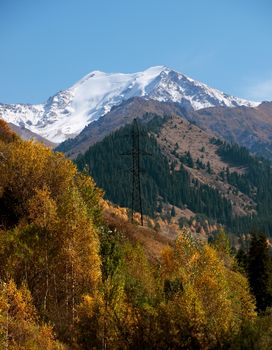 High-voltage power line through Alps mountains