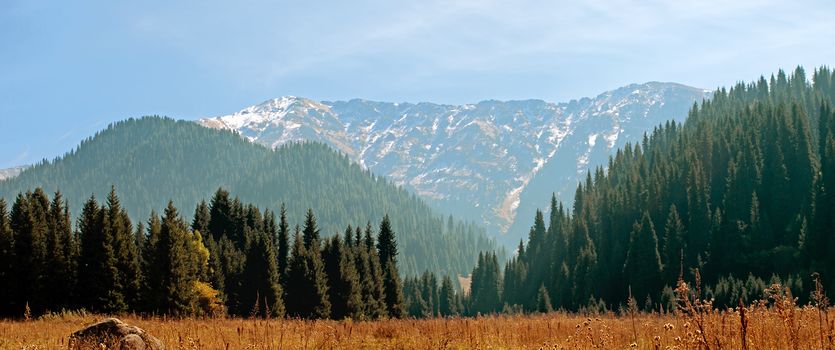 Panorama view of beautiful mountains landscape in alps