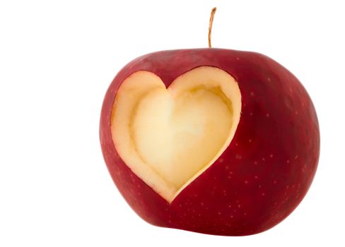 Red apple with a heart symbol isolated on white