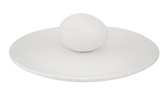 Egg on a dish isolated on a white. Clipping path included.