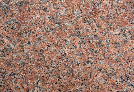 Red granite or marble surface for decorative works.