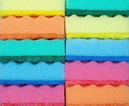 Close-up of colorful kitchen sponges background.