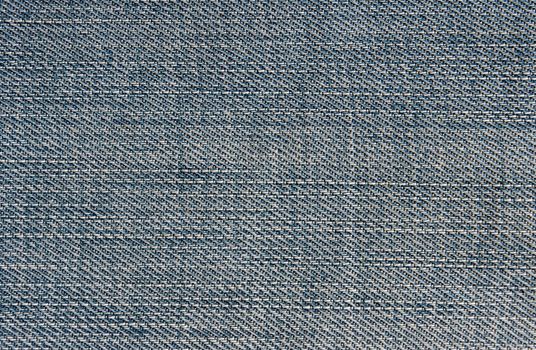 High resolution image of actual blue cotton denim fabric.