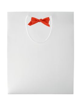 White shopping bag with red bow isolated on white. Clipping path included.