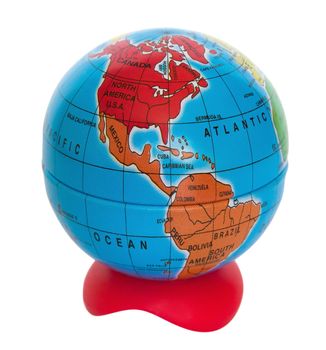 Close up of globe on white background with clipping path. 