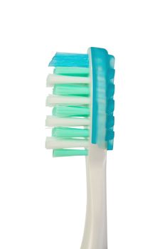 Close-up of single tooth brush isolated on white background.