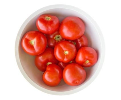 Dish of the fresh red tomatoes isolated on white. Clipping path included.