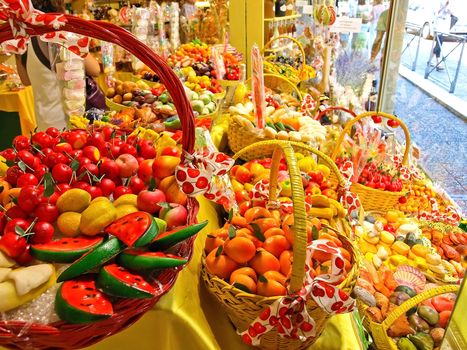 Vendor display colorful assortment of sweet candy at in Nice, France.