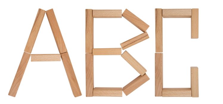Alphabet letters of wooden toy blocks isolated on white background. Clipping path included.