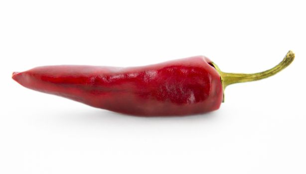 Red hot chili pepper isolated over white background.