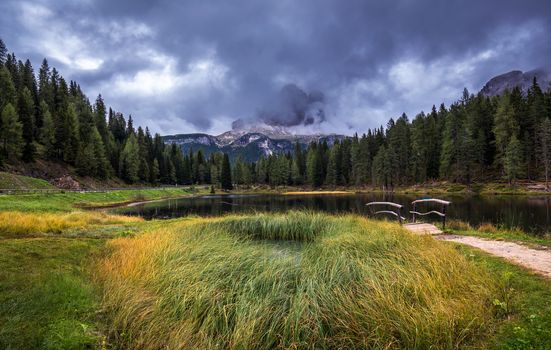 Antorno lake with famous Tre Cime di Lavaredo (Drei Zinnen) mount. Dolomite Alps, Province of Belluno, Italy, Europe. Beauty of nature concept background.