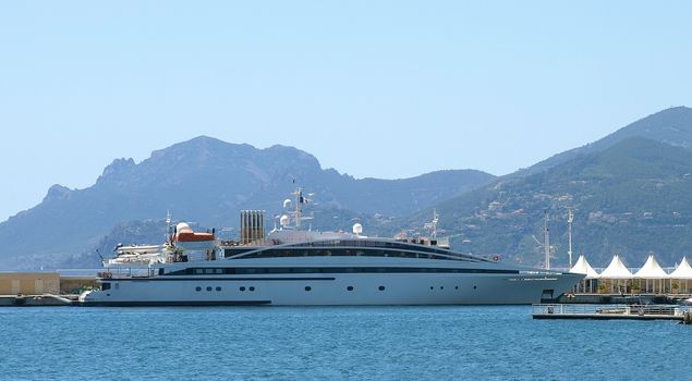 Large luxury yacht in the harbor of Cannes, France