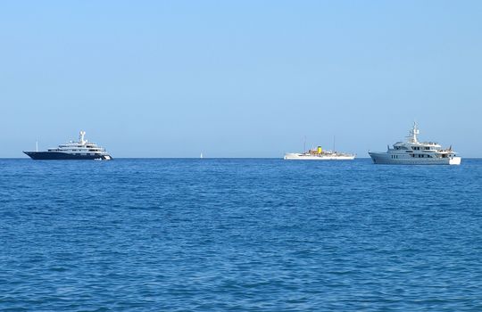 Luxury yachts and old passenger ship in Saint-Tropez, French Riviera