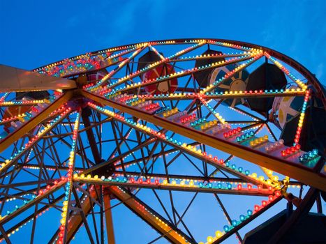 Ferris wheel in a summer night in Paris, France.