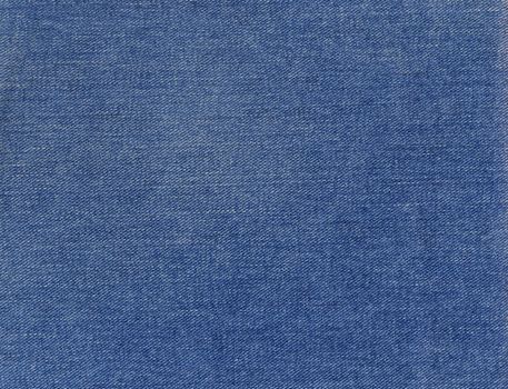 High resolution image of actual blue cotton denim fabric.