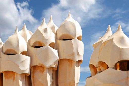 Chimneys of Casa Mila, the famous building designed by the architect Gaudi. One of the most popular touristic attractions of Barcelona.
BARCELONA SPAIN - JULY 19: Modernism style architecture. Casa Mila aka La Pedrera (Catalan for 'The Quarry'), built in 1906-1910. July 19, 2009 in Barcelona, Spain.