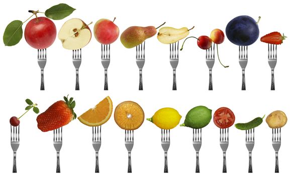 Fruits and vegetables on forks isolated on a white background.