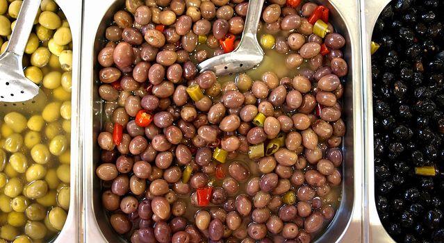 Pickled olives for sale in an open market in France.