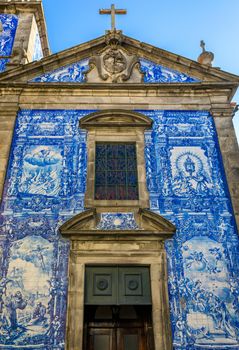 Traditional historic facade in Porto decorated with blue hand painted tin-glazed tiles, Oporto, Portugal