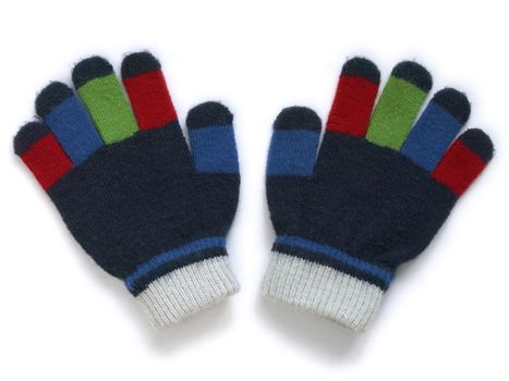 Children's woollen gloves isolated over white background