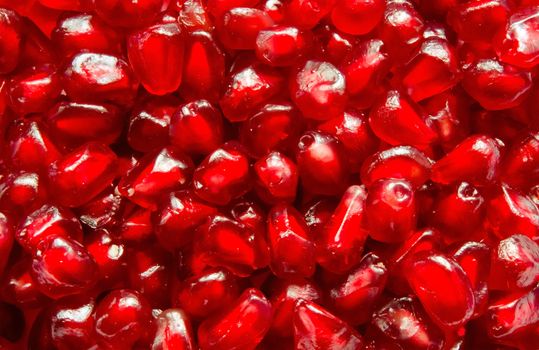 Macro of peeled ripe seeds pomegranate