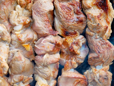 Closeup of shashlik on a metal skewers