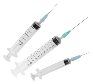 Three empty syringes isolated over white background. Clipping path.