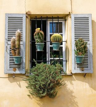 Traditional French window with shutters in Nice, France