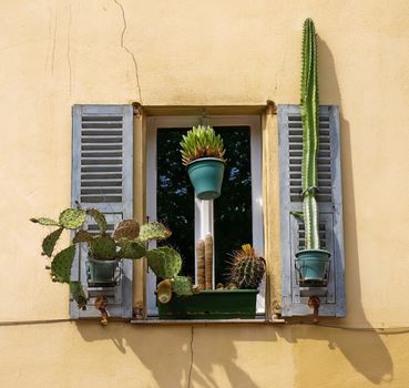 Traditional French window with shutters in Nice, France