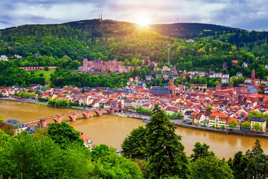 Panoramic view of beautiful medieval town Heidelberg including Carl Theodor Old Bridge, Neckar river, Church of the Holy Spirit, Germany