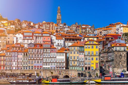 Ancient city of Porto with old multi-colored houses with red roof tiles. Portugal, Porto