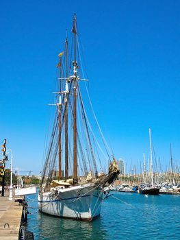 Sailboat anchored at Barcelona Harbor, Spain.