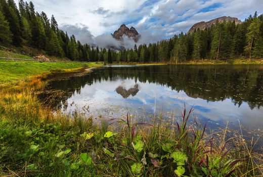 Antorno lake with famous Tre Cime di Lavaredo (Drei Zinnen) mount. Dolomite Alps, Province of Belluno, Italy, Europe. Beauty of nature concept background.