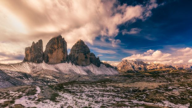 View of the National Park Tre Cime di Lavaredo, Dolomites, South Tyrol. Location Auronzo, Italy, Europe. Dramatic cloudy sky. Beauty world.