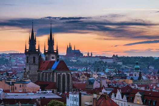 Panorama of Prague with red roofs from above summer day at dusk, Czech Republic
