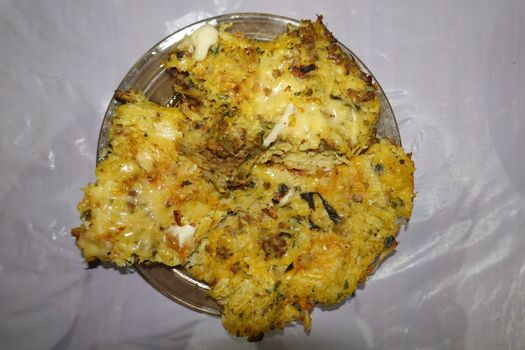 a delicious moroccan potato meal in a glass dish.