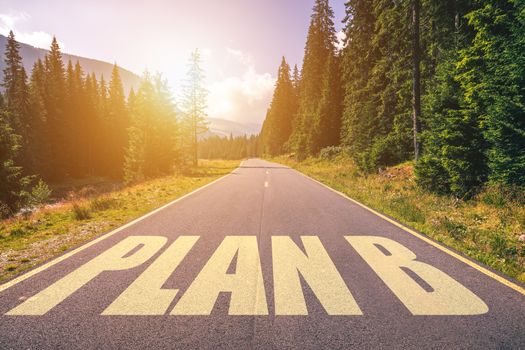 Plan B text written on road in the mountains
