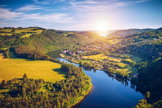River canyon with dark water and autumn colorful forest. Horseshoe bend, Vltava river, Czech republic. Beautiful landscape with river. Solenice lookout.