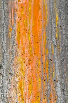 A layer of rust covers a concrete slab.