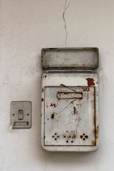 Mailbox and old light switch.