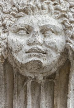 Mask of Medusa in Corso Porta Borsari in Verona, Italy.
