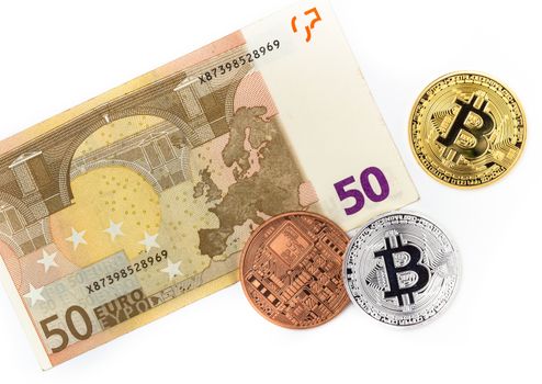 Three bitcoin and one european currency of 50 euro, in a white background. Ideal for concepts.