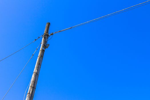 Pylon with blue sky in the background.