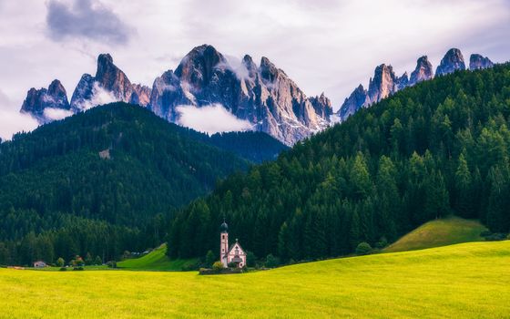 Famous best alpine place of the world, Santa Maddalena (St Magdalena) village with magical Dolomites mountains in background, Val di Funes valley, Trentino Alto Adige region, Italy, Europe
