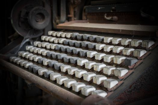 Details of an old keyboard on industrial machine of the late nineteenth century.