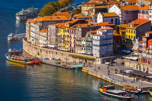 Panoramic view of Old city of Porto (Oporto) and Ribeira over Douro river, Portugal. Concept of world travel, sightseeing and tourism.